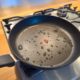 Teflon coated pan on stove. Potential dangerous chemicals in cookware, non stick frying.